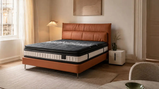 Esteller bed in a compact bedroom with warm neutral styling, slim bedside furniture, and clear walking space for a balanced Singapore home.