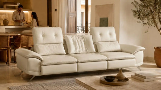 Cream leather sofa in an Italian-inspired living room showing European design heritage for modern homeowners