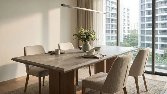 Sintered stone dining table with clean edge profile in a modern Singapore condo dining room