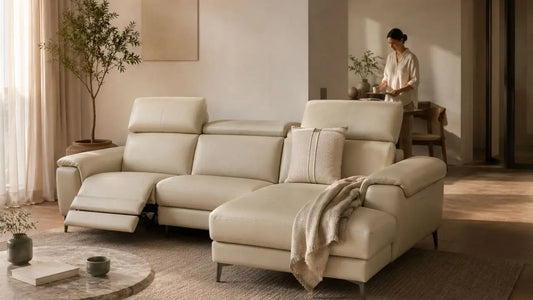 Italian-inspired beige leather sectional sofa in a warm refined living room with relaxed Mediterranean styling