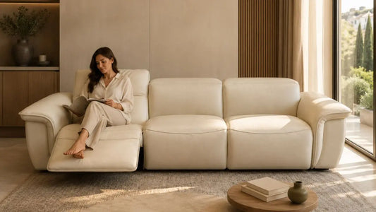 Cream recliner sofa in an Italian modern living room with warm neutral styling