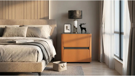 Orange bedside table with drawer storage beside an upholstered bed in a modern Singapore bedroom