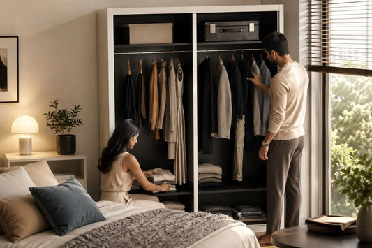 Italian-inspired bedroom with open couple wardrobe showing organised hanging space, folded clothes and shared internal layout zones