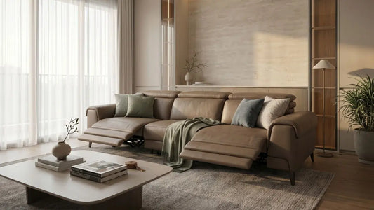 Brown leather recliner sofa in a warm Singapore living room showing sofa width, depth, and coffee table clearance.