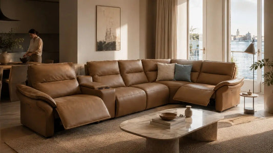 Tan leather recliner sofa in an Italian-inspired living room showing how to furnish a home in phases with a cohesive layered look