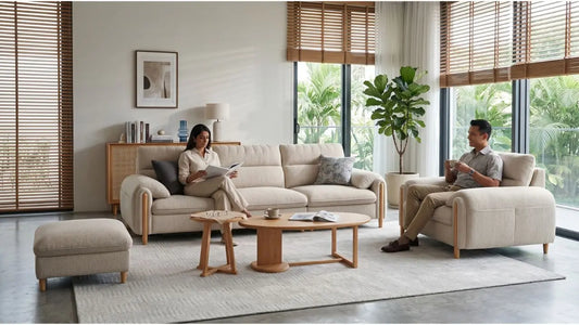 Couple using a beige performance fabric sofa set in a Singapore home with stain-resistant upholstery for daily living